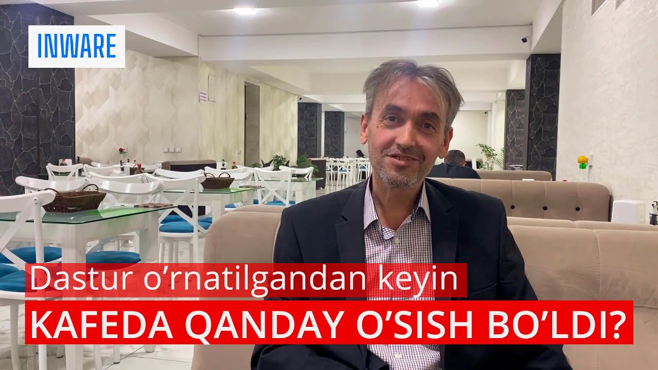 Person analyzing financial data on multiple monitors, representing banking operations